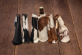 Myra Cowhide Long Neck Koozies